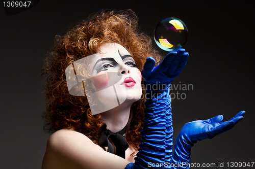 Image of woman mime with soap bubbles.