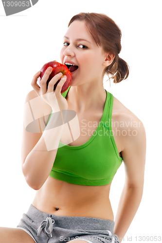 Image of woman in sportswear with apple