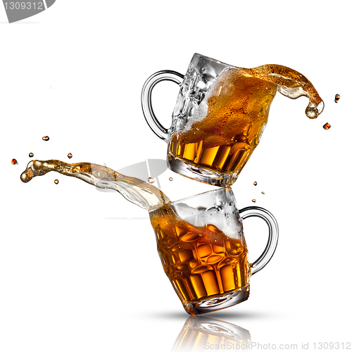 Image of Beer splash in glasses isolated on white