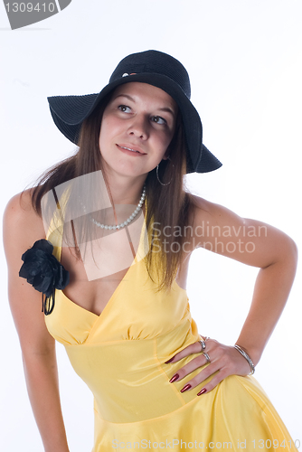 Image of Pretty woman in yellow dress