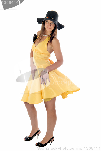 Image of Pretty woman in yellow dress