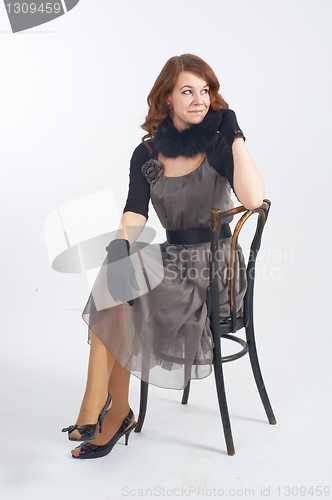 Image of Pretty woman on chair