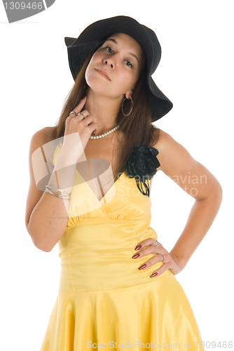 Image of Pretty woman in yellow dress