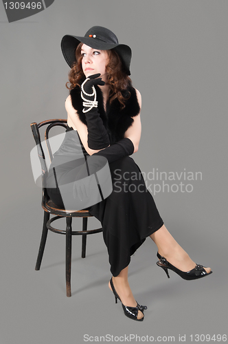 Image of Young woman in black