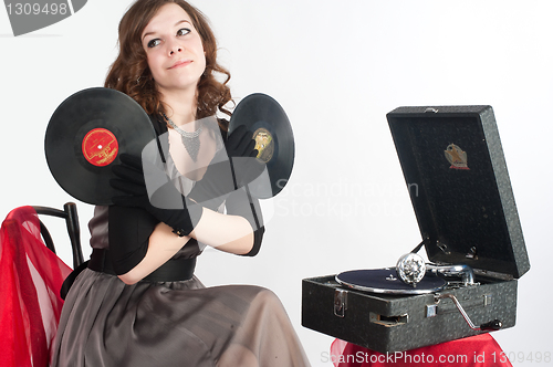 Image of Beautiful woman with gramophone,