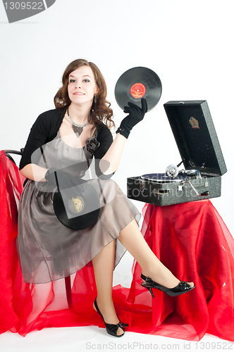 Image of Beautiful woman with gramophone,