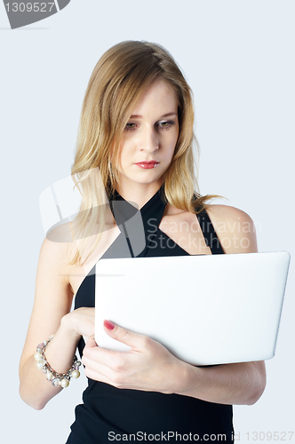 Image of Attractive blonde girl with laptop