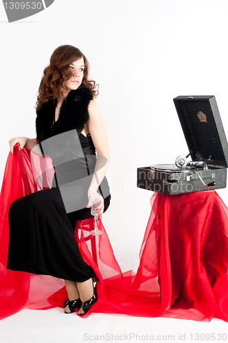 Image of Beautiful woman with gramophone,