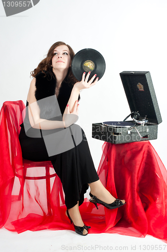 Image of Beautiful woman with gramophone,