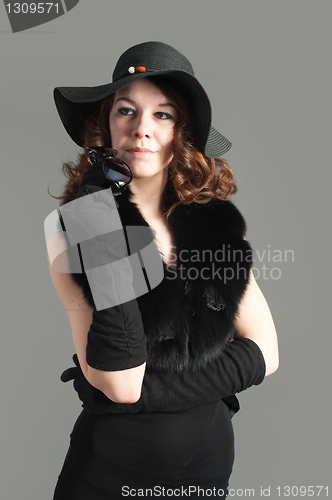 Image of Young woman in black