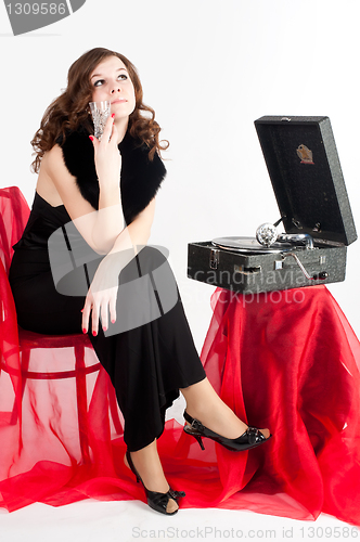 Image of Beautiful woman with gramophone,