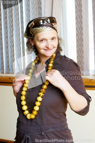 Image of Woman with amber beads