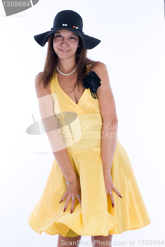 Image of Pretty woman in yellow dress