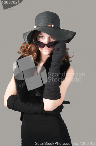 Image of Young woman in black