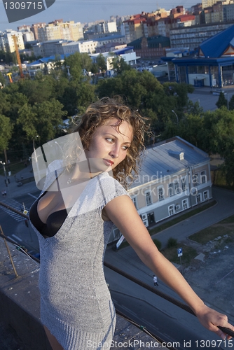 Image of Girl on roof