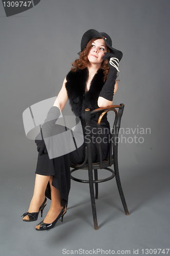 Image of Pretty woman on chair