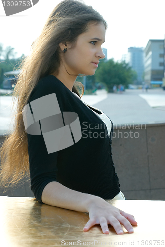 Image of Young waiting woman