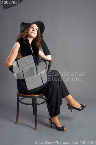 Image of Pretty woman on chair