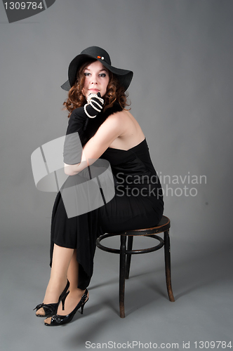 Image of Young woman in black