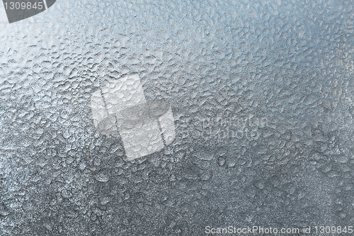 Image of frozen water drops on glass