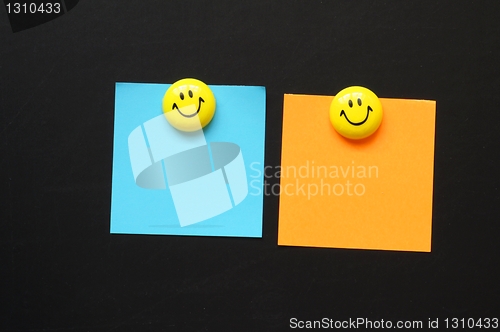 Image of smiley and paper with copyspace