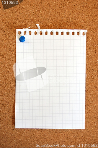 Image of empty sheet paper with push pin