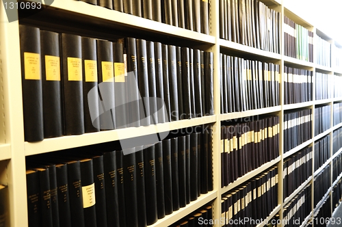 Image of old books in a library