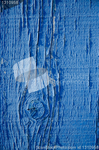 Image of Blue paint on wood background