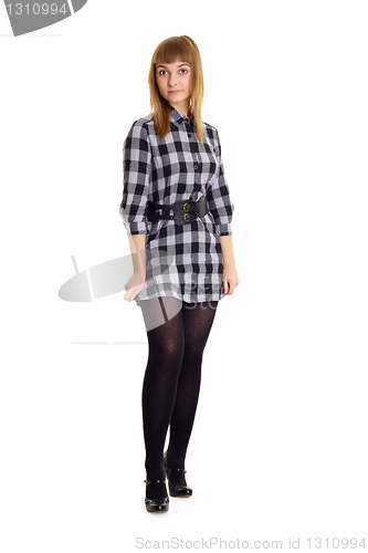Image of Young woman stands on white background