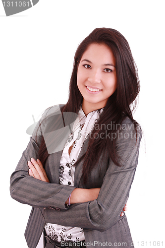 Image of portrait of a happy young business woman standing with folded ha