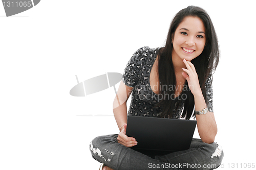 Image of happy young beautiful woman with laptop 