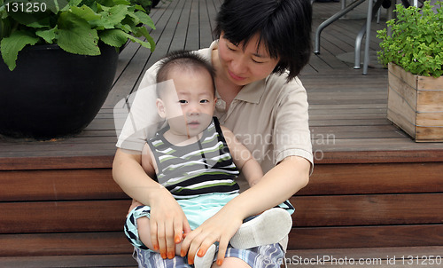 Image of Asian mother and son