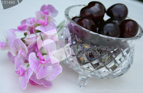 Image of Sweet peas together with cherries