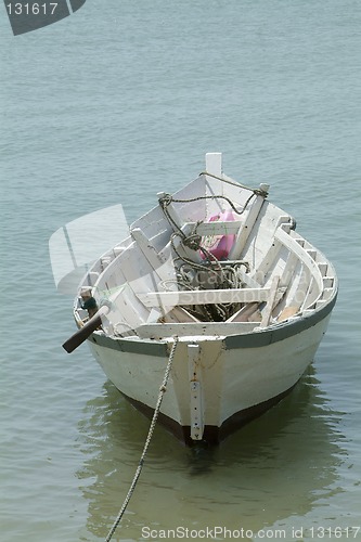 Image of Small, white, wooden fishing boat