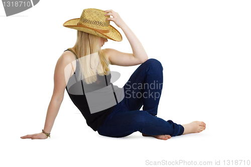Image of attractive girl in the wicker hat