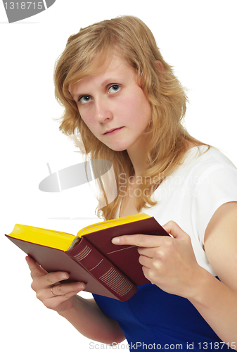 Image of The girl - student reading textbook