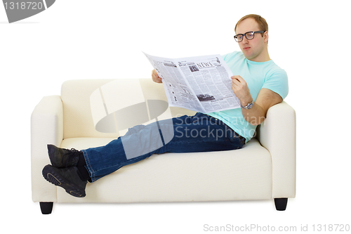 Image of Person reading a newspaper