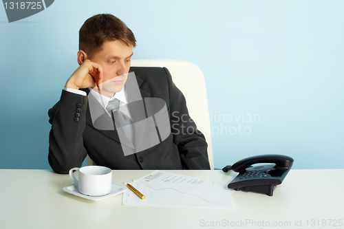 Image of business man waiting for a phone call