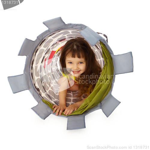 Image of Little girl hiding inside the basket