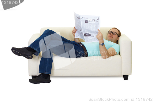 Image of man reading a newspaper