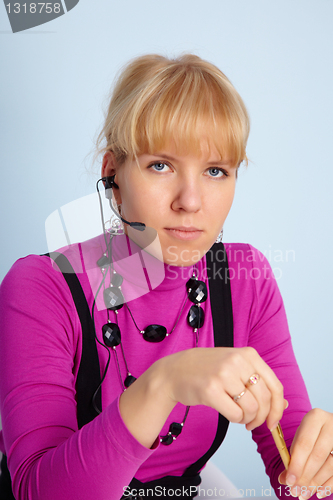 Image of Young girl - worker of call center