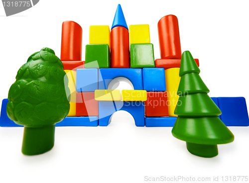 Image of Toy colored castle and plastic trees