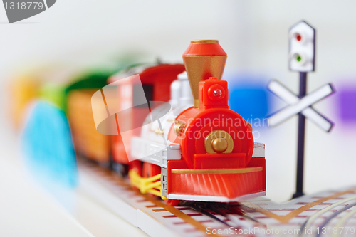 Image of Toy railway - red engine closeup