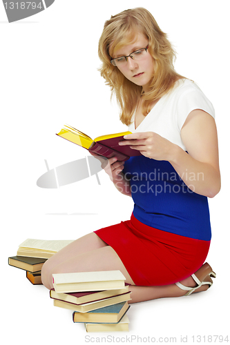 Image of Young woman reading a book