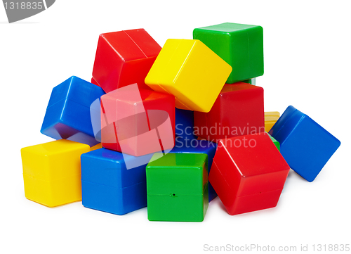 Image of Pile of colored toy blocks on white