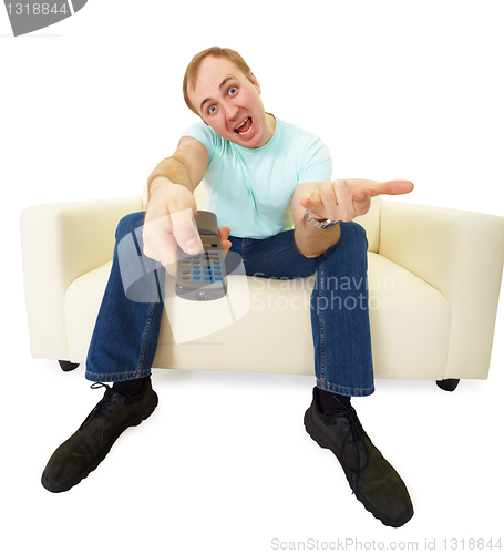 Image of Man with TV remote control