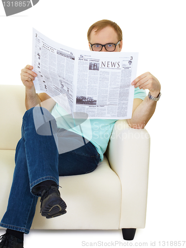 Image of man reads the news in the newspaper