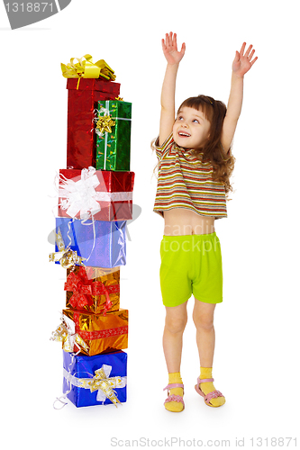 Image of Little girl enjoys birthday gift