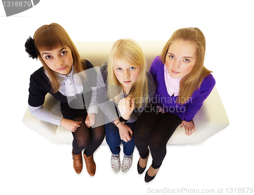 Image of Three girlfriends teen on the couch