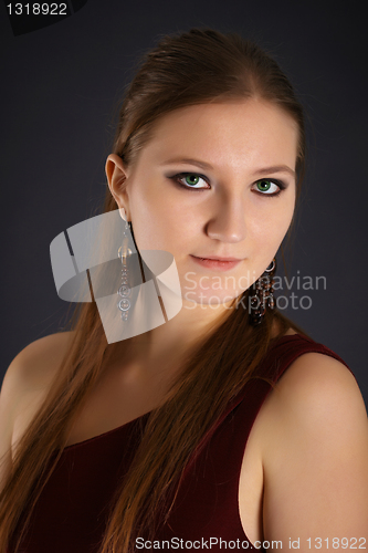 Image of Beautiful young woman with red hair